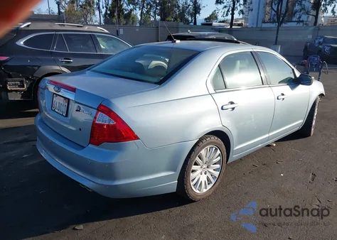 2010 Ford Fusion Hybrid из США, поврежденный, VIN 3FADP0L30AR142715